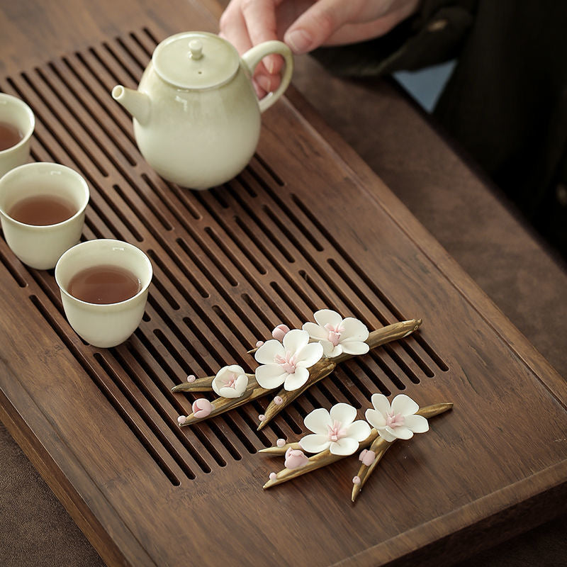 Hand-kneaded flower tea pet ceramics hand-made wintersweet branch plum blossom ornament