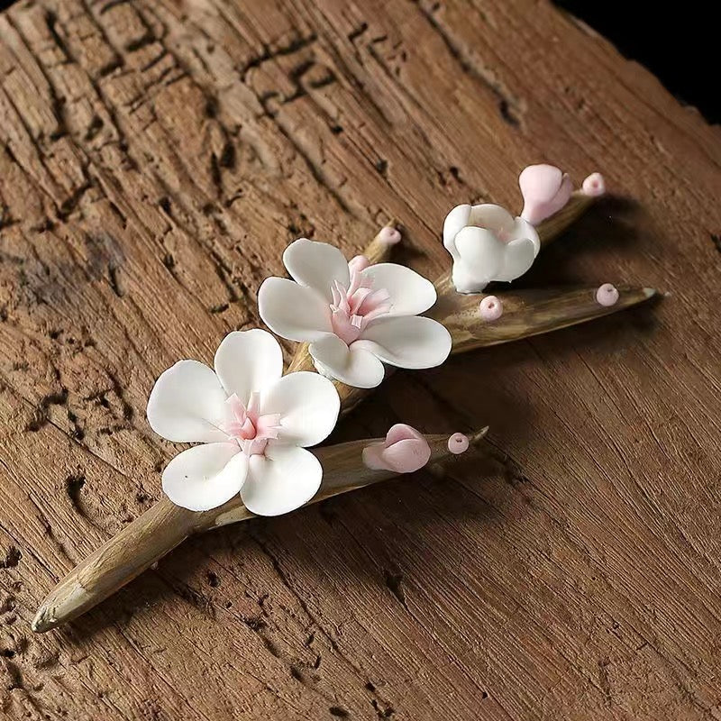 Hand-kneaded flower tea pet ceramics hand-made wintersweet branch plum blossom ornament