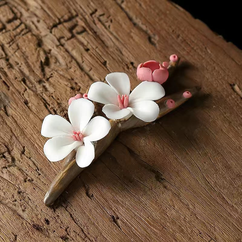 Hand-kneaded flower tea pet ceramics hand-made wintersweet branch plum blossom ornament