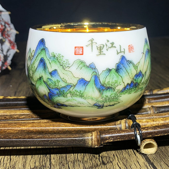 Hand painted golden tea cup in the painting of green thousand miles of rivers and mountains
