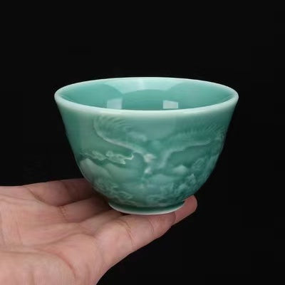 Chinese antique celadon embossed dragon cup