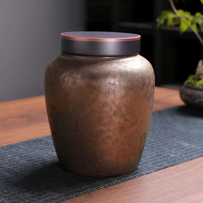 Gilded rust glazed Tea Jar