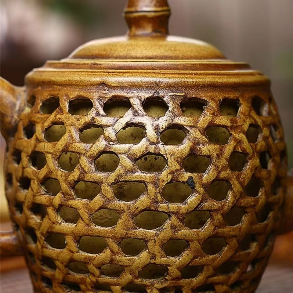 Purple clay hollowed out double-layer bamboo Teapot