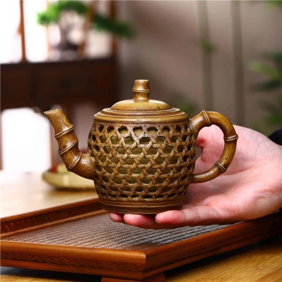 Purple clay hollowed out double-layer bamboo Teapot