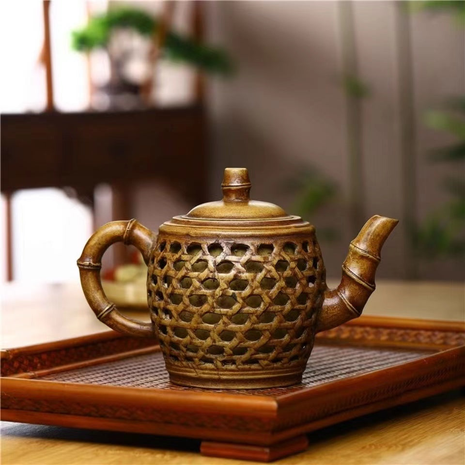 Purple clay hollowed out double-layer bamboo Teapot