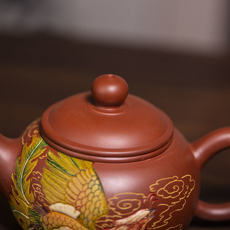 High-grade red clay relief carving Danfeng purple sand pot