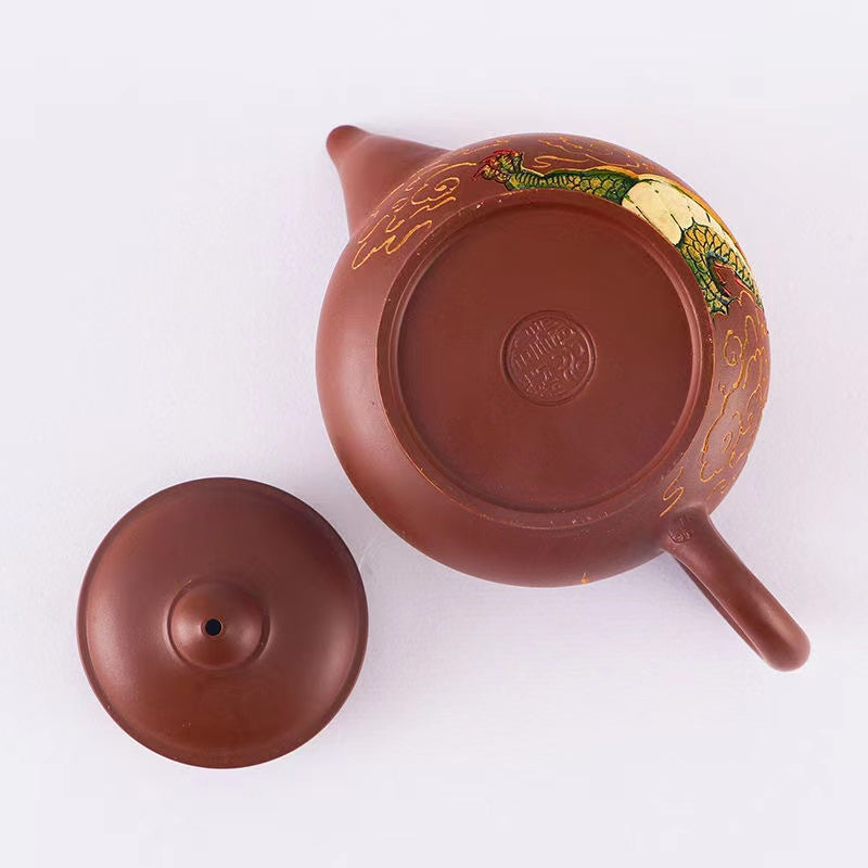 Purple sand three-dimensional relief carving Sheng Shi Long Teng Teapot