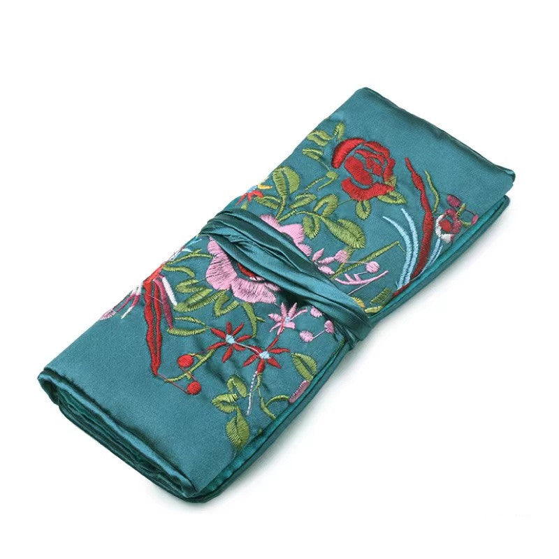 Embroidery roll jewelry bag