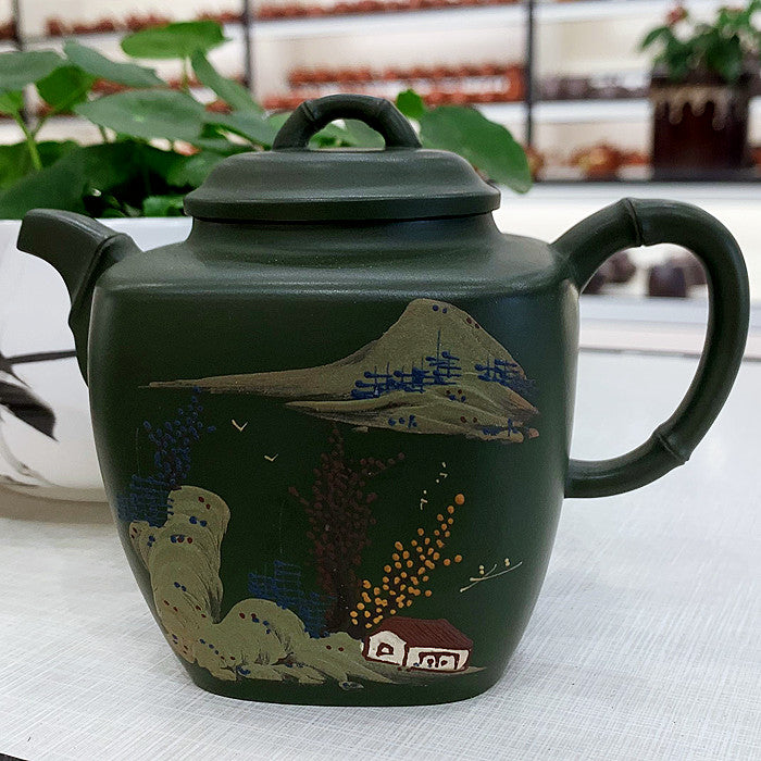 Green hand-painted purple clay teapot