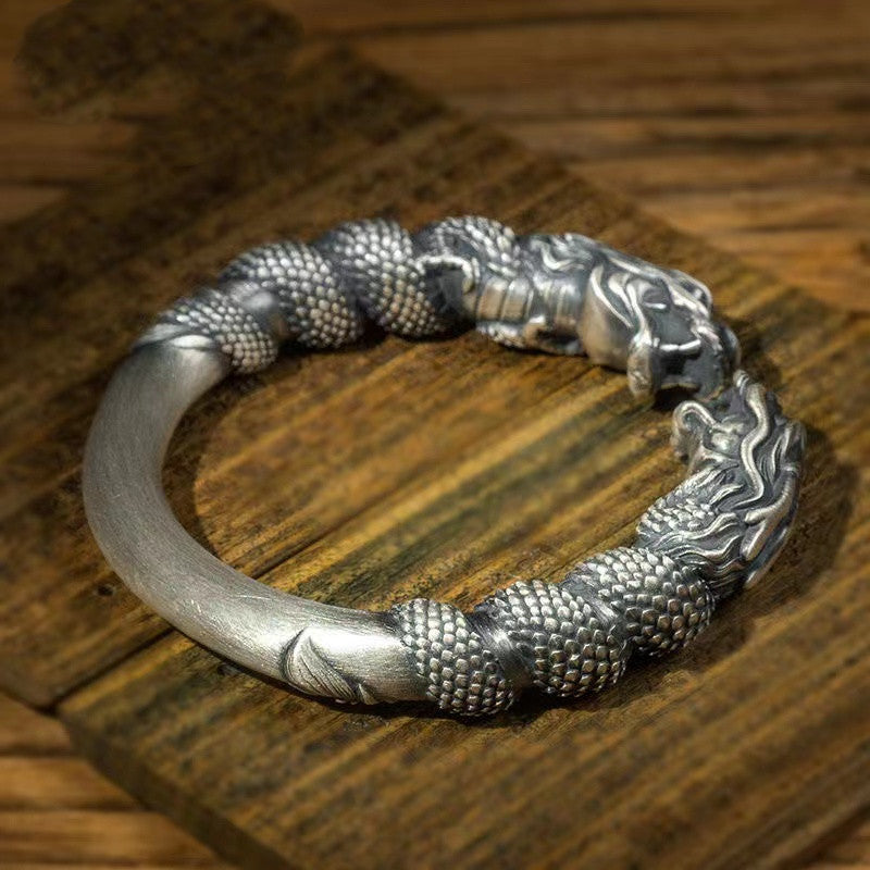 Double dragon twist silver bracelet