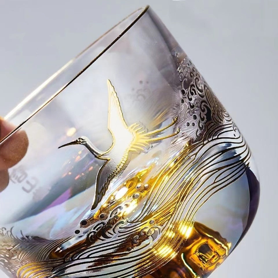 Glowing gold and silver burnished glass Teacup