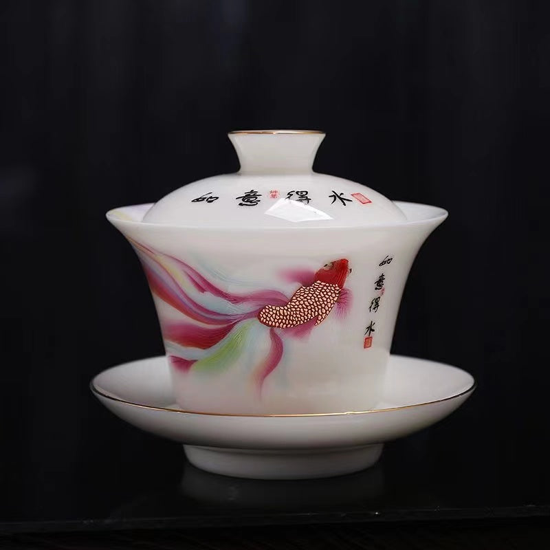 Dehua fine white porcelain gold-coloured goldfish tea bowl