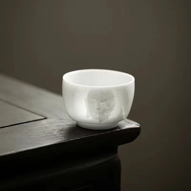 Dehua icy jade porcelain hand-embossed white porcelain Tea Cup