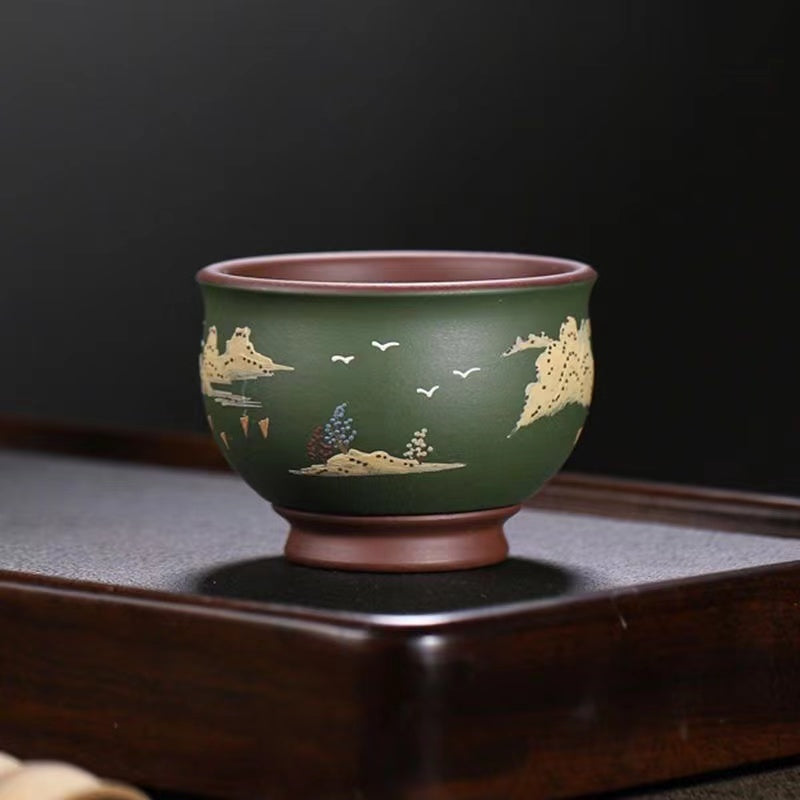 An original Yixing purple sand and mountain cement painted Teacup