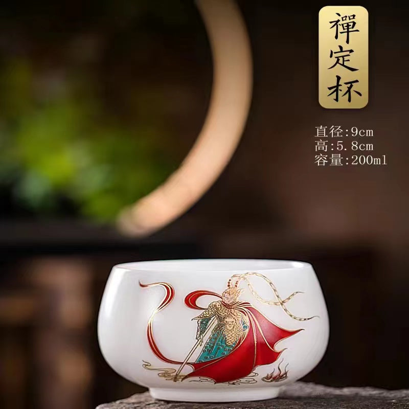 A hand-painted teacup with the Monkey King design in sheep's fat jade