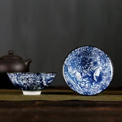 A blue and white porcelain tea cup with bucket cup