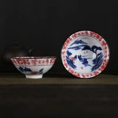 A blue and white porcelain tea cup with bucket cup