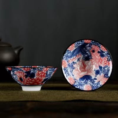 A blue and white porcelain tea cup with bucket cup