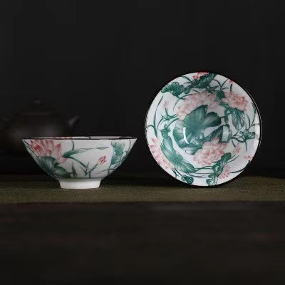 A blue and white porcelain tea cup with bucket cup