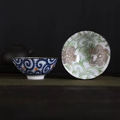 A blue and white porcelain tea cup with bucket cup