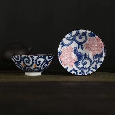 A blue and white porcelain tea cup with bucket cup