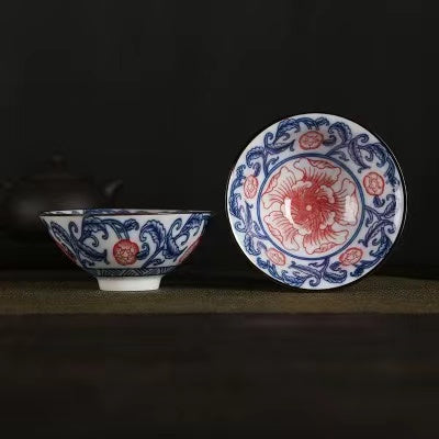 A blue and white porcelain tea cup with bucket cup