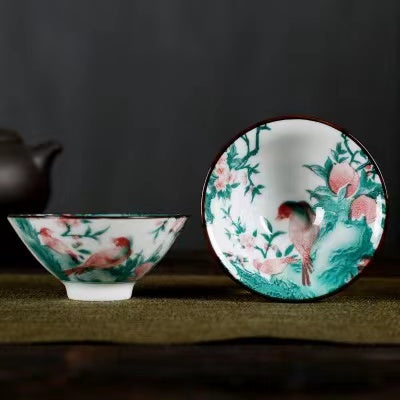 A blue and white porcelain tea cup with bucket cup