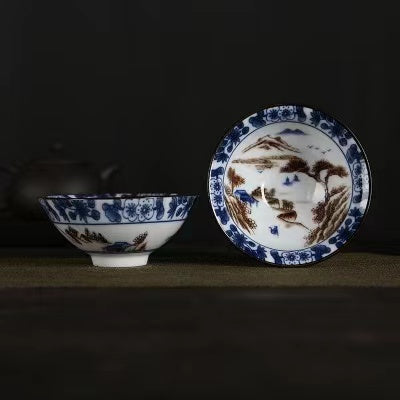 A blue and white porcelain tea cup with bucket cup