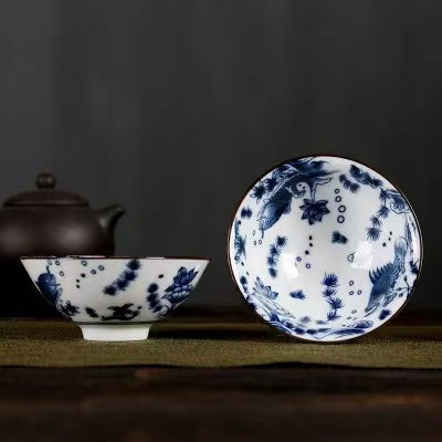 A blue and white porcelain tea cup with bucket cup