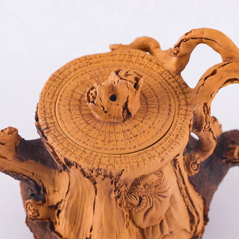 Master Collection------A purely handmade superior flower stump teapot in relief duan clay from Yixing(M541)