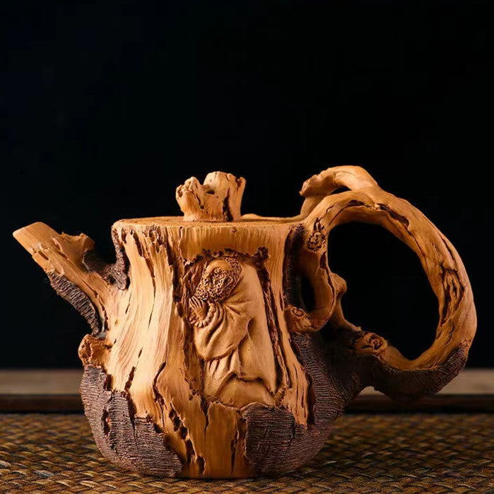 Master Collection------A purely handmade superior flower stump teapot in relief duan clay from Yixing(M541)