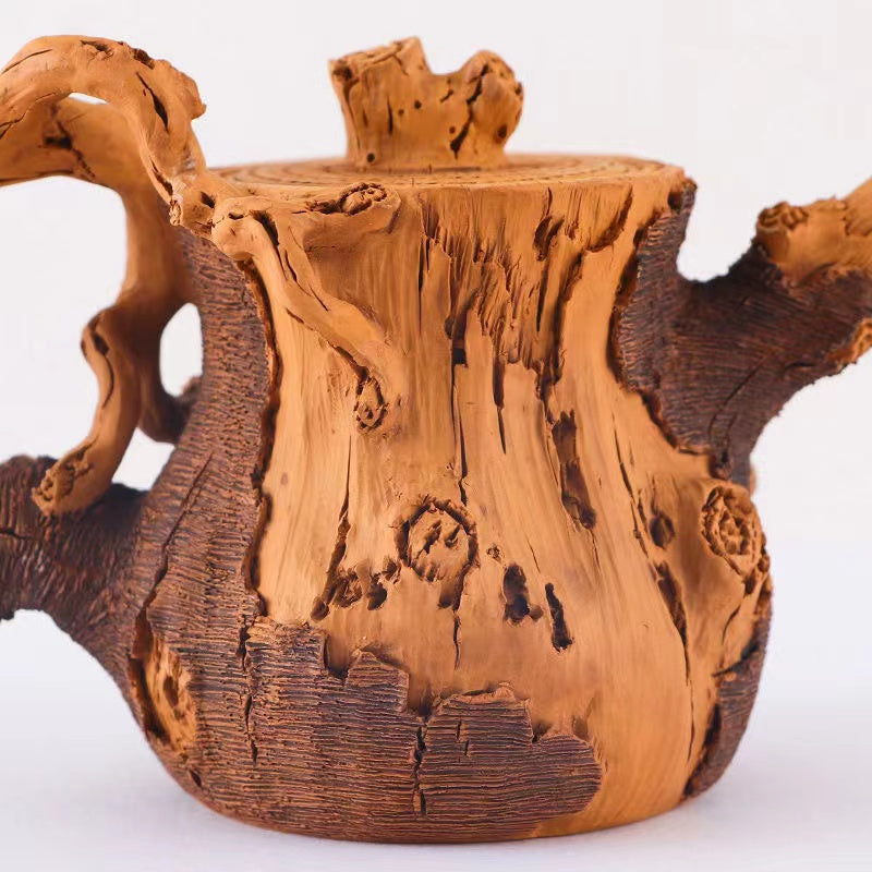 Master Collection------A purely handmade superior flower stump teapot in relief duan clay from Yixing(M541)