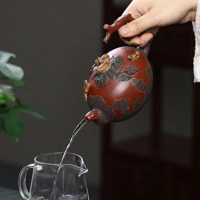 Yixing backflow pot imitating an old pot handmade squirrel and grape Teapot