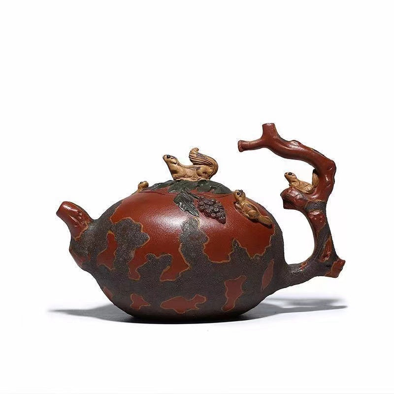 Yixing backflow pot imitating an old pot handmade squirrel and grape Teapot