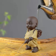 Load image into Gallery viewer, Purple sand tea pet ornament peeing doll squirting urine child Tea pet
