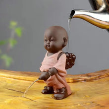 Load image into Gallery viewer, Purple sand tea pet ornament peeing doll squirting urine child Tea pet
