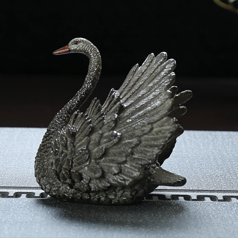 Color changing swan tea pet