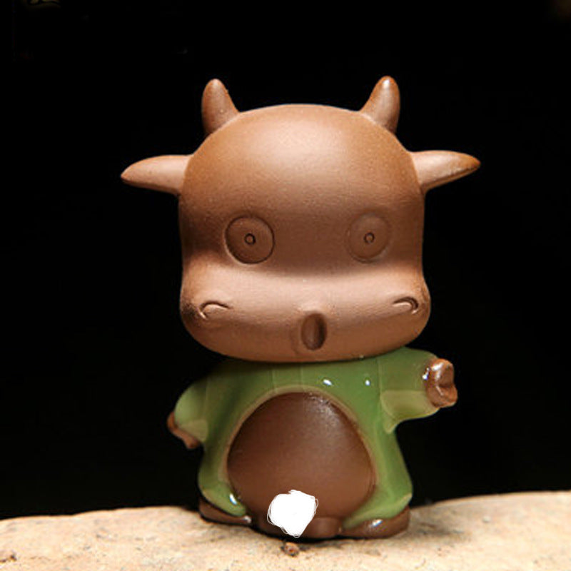 Peeing ox purple clay tea pet